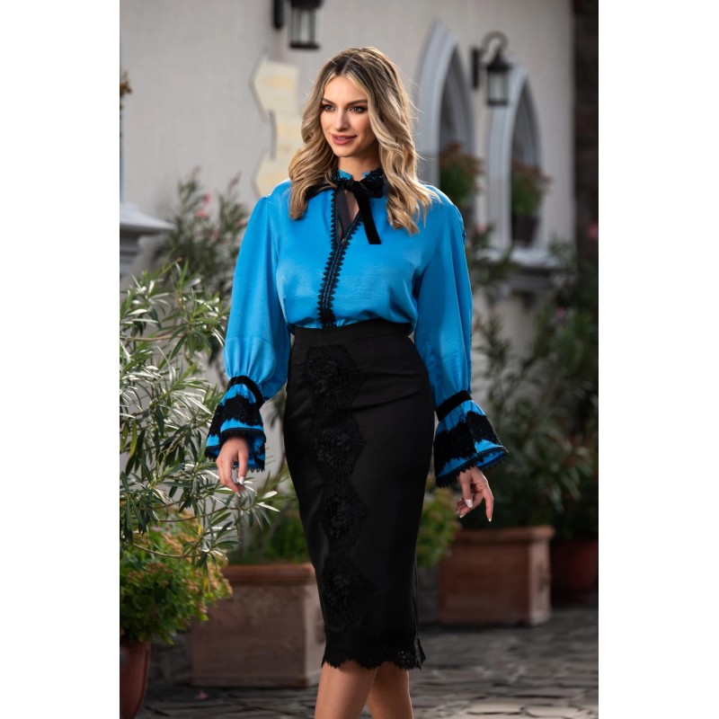 Bluza contemporana cu accente simbolice arhaice