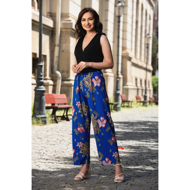 Salopeta casual cu pantalon albastru evazat si imprimeu floral
